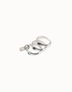 Anillo triple bañado en plata de ley con cristales azules.