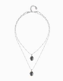 Collar doble bañado en plata con dos cristales facetados ovalados negros