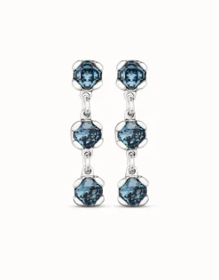 Pendientes bañados en plata de ley con cristales azules
