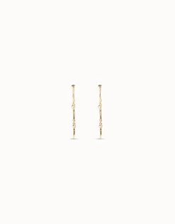 Pendientes largos bañados en oro de 18k con el icónico clavo de UNOde50