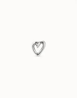 Piercing bañado en plata de ley de ''corazón clavado''