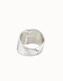 Pulsera bañada en plata de ley con múltiples cabezas de clavo