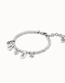 Pulsera bañada en plata de ley con charm corazón, trébol y mano