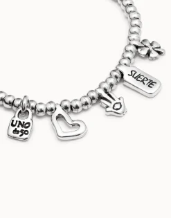 Pulsera bañada en plata de ley con charm corazón, trébol y mano