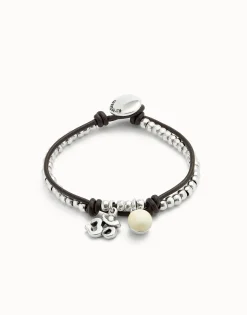 Pulsera bañadas en plata de ley con cuero y cristal de murano marfil
