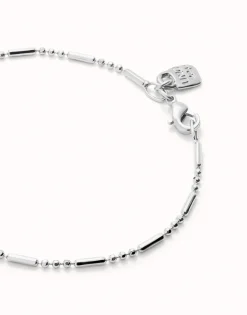 Pulsera con bolas y piezas alargadas bañada en plata de ley