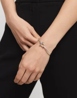 Pulsera con cierre frontal bañada en plata de ley con topacio blanco