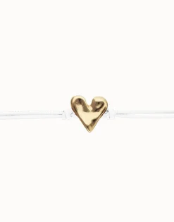 Pulsera de cuero blanco con detalle de corazón bañado en oro 18k