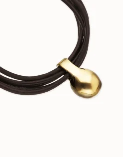 Pulsera de cuero con esfera bañada en oro 18k