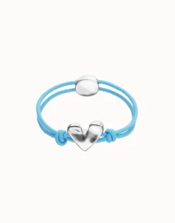 Pulsera de hilo elástico azul con corazón bañado en plata de ley