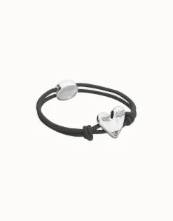 Pulsera de hilo elástico negro con corazón bañado en plata de ley