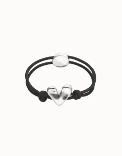 Pulsera de hilo elástico negro con corazón bañado en plata de ley