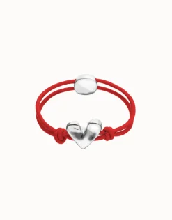 Pulsera de hilo elástico rojo con corazón bañado en plata de ley