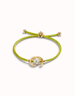 Pulsera de hilo lima con perla shell fornitura bañada en oro 18k.