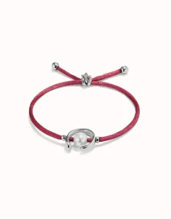 Pulsera de hilo malva con perla shell fornitura bañada en plata de ley.
