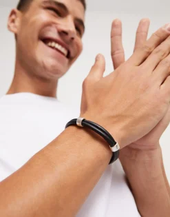 Pulsera doble cuero con 2 circunferencias bañadas en plata de ley