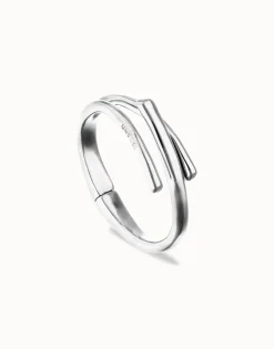 Pulsera rígida bañada en plata de ley con tres formas orgánicas entrelazadas