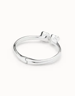 Pulsera rígida bañada en plata de ley, con muelle interior y dos cristales azules