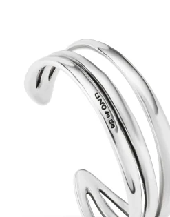 Pulsera rígida triple con curvas bañada en plata de ley